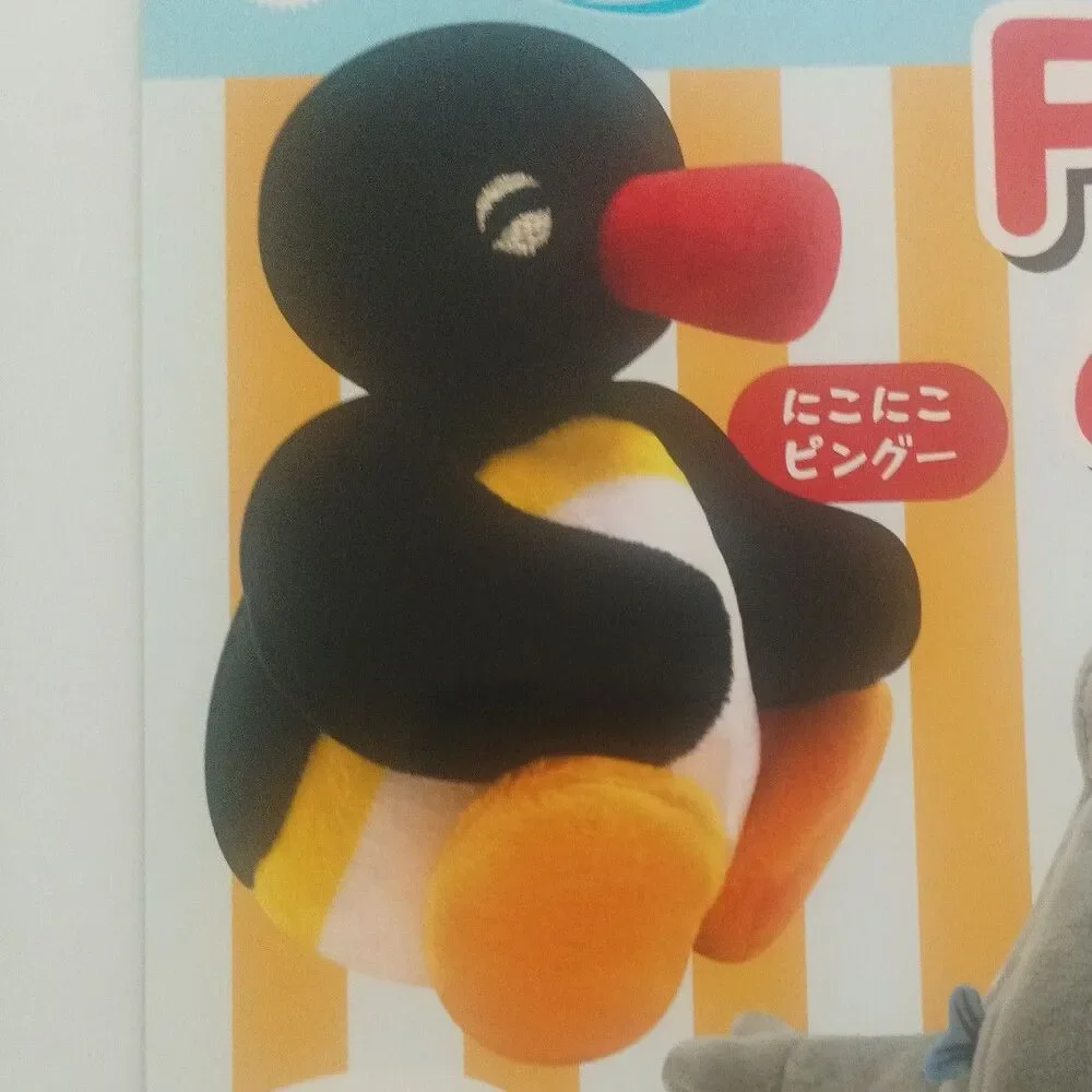 Pingu sitting down mini plush keychain